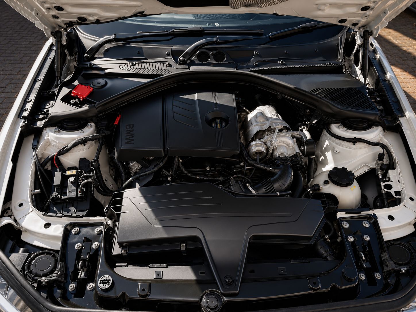 Car engine compartment with visible components