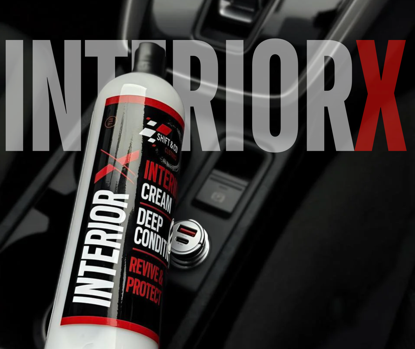 Car interior care product with 'INTERIORX' branding on a car dashboard.